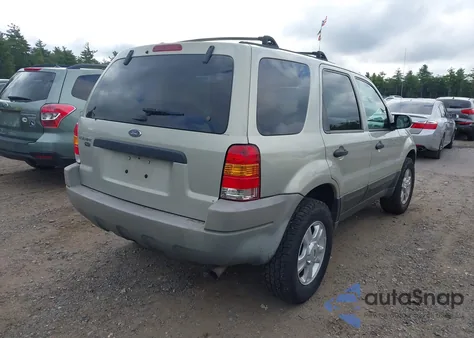 2004 Ford Escape Xlt z USA, uszkodzony, nr VIN 1FMYU93184KB51478